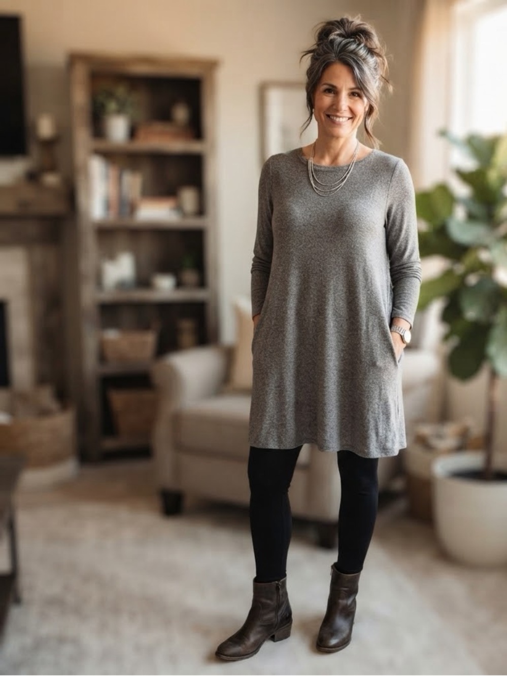 This garment is a long-sleeve, heather-gray tunic from J.Jill’s Pure Jill collec